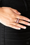 Featuring refined marquise cuts, glittery red rhinestones flare from a center of glassy white rhinestones, creating a regal band across the finger. Features a stretchy band for a flexible fit. Sold as one individual ring.  P4RE-RDXX-083XX