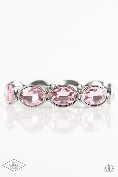 Glassy pink gems are pressed into sleek silver frames. Infused with dainty silver beads, the glittery frames are threaded along stretchy elastic bands for a glamorous look around the wrist. Sold as one individual bracelet.  This Fan Favorite is back in the spotlight at the request of our 2020 Life of the Party member with Black Diamond Access, Lauren N.  P9RE-PKXX-118XX