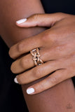Encrusted in glittery rhinestones, shimmery copper bars crisscross across the finger, coalescing into a bold square knot atop the finger. Features a stretchy band for a flexible fit. Sold as one individual ring. P4RE-CPXX-099XX
