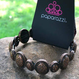 2018 June FF Exclusive Copper Stretchy Bracelet Stamped in indigenous inspired patterns, antiqued copper frames are threaded along elastic stretchy bands and link around the wrist for a seasonal look. Sold as one individual bracelet. P9TR-CPXX-068XZ