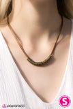 Timeless brass rings are threaded along shiny cording, creating an urban look below the collar. Features a clasp closure. Sold as one individual necklace.  *** No earrings included ***  P2UR-BRXX-020XX