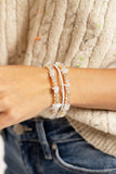 Notoriously Nuanced - White Bracelet ❤️ Paparazzi