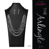 Attached to two strips of black leather, strands of bedazzled white rhinestone encrusted silver beads drape between an exaggerated display of mismatched silver and gunmetal chains down the chest. With its edgy sparkle, grunge meets glamour in this heart-stopping statement-maker. Features an adjustable clasp closure. Sold as one individual necklace. Includes one pair of matching earrings.  Named after 2020 Rock the Runway winner, Arlingto L.  Z2009