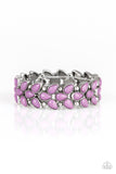 Faceted purple teardrop beads and shimmery silver studs coalesce into ornate frames. The whimsical frames are threaded along stretchy bands around the wrist for a seasonal look. Sold as one individual bracelet.  P9WH-PRXX-189XX