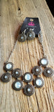 2020 April Life Of The Party Exclusive A collection of opalescent white gems dot the centers of studded silver frames that connect into a starry centerpiece below the collar. Features an adjustable clasp closure. Sold as one individual necklace. Includes one pair of matching earrings.  P2ST-WTXX-062XX