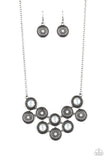 2020 April Life Of The Party Exclusive A collection of opalescent white gems dot the centers of studded silver frames that connect into a starry centerpiece below the collar. Features an adjustable clasp closure. Sold as one individual necklace. Includes one pair of matching earrings.  P2ST-WTXX-062XX