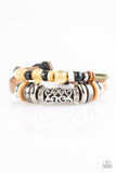 An array of glassy, wooden, and metallic beads slide along one leather strand and a rustic green cord, creating colorful layers across the wrist. Features an adjustable sliding knot closure. Sold as one individual bracelet.  P9UR-BNXX-282XX