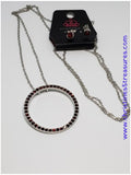 2018 October Fashion Fix Exclusive Encrusted in glittery red rhinestones, a dramatic silver hoop swings from the bottom of a lengthened silver chain for a refined look. Features an adjustable clasp closure. Sold as one individual necklace. Includes one pair of matching earrings.