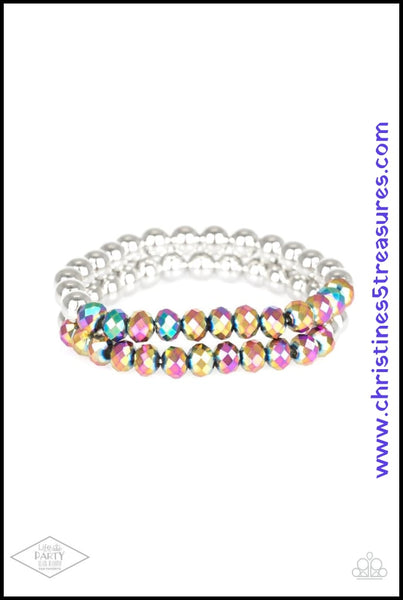 2020 Life of the Party member with Black Diamond Access  Dipped in a rainbow iridescence, a collection of metallic crystal-like beads and shiny silver beads are threaded along two stretchy bands around the wrist for a refined look. Sold as one set of two bracelets.   This Fan Favorite is back in the spotlight at the request of our 2020 Life of the Party member with Black Diamond Access, Karla N.   P9RE-MTXX-057XX