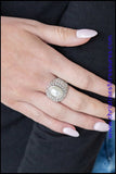 2019 August Life Of The Party Exclusive  A pearly white bead is pressed into the center of a bold silver band radiating with countless white rhinestones, creating a dramatic statement piece atop the finger. Features a stretchy band for a flexible fit. Sold as one individual ring.  P4RE-WTXX-330XX