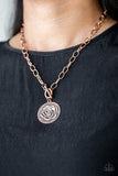 Embossed in a whimsical rosebud pattern, a shimmery copper frame swings below the collar for a casual look. Features a toggle closure. Sold as one individual necklace. Includes one pair of matching earrings. P2WH-CPXX-139XX