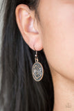 Embossed in a whimsical rosebud pattern, a shimmery copper frame swings below the collar for a casual look. Features a toggle closure. Sold as one individual necklace. Includes one pair of matching earrings. P2WH-CPXX-139XX