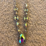 2019 Pink Diamond Bring Back Piece Featuring regal marquise style cuts, glittery white rhinestones trickle along a shimmery silver chain below the collar. A dramatic teardrop rhinestone drips from the center, creating a breathtaking pendant. Features an adjustable clasp closure.   2019 Pink Diamond Bring Back Piece By Marissa K.  P2RE-MTXX-133XX