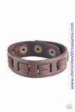 Brown suede laces are threaded along the front a leather band for a rugged look. Features an adjustable snap closure. Sold as one individual bracelet. P9UR-BNXX-376XX