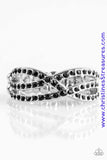 Encrusted in glittery black rhinestones, shimmery ribbons of silver crisscross across the finger in a timeless fashion. Features a dainty stretchy band for a flexible fit. Sold as one individual ring.  P4DA-BKXX-058XX