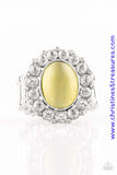 Glassy white rhinestones spin around a glowing yellow moonstone center, creating a whimsical floral frame atop the finger. Features a stretchy band for a flexible fit. Sold as one individual ring.  P4RE-YWXX-036XX