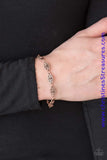 Brushed in an antiqued shimmer, dainty floral charms link across the wrist for a seasonal look. Features an adjustable clasp closure. Sold as one individual bracelet.  Get The Complete Look! Necklace: "Daisy Dream - Copper" (Sold Separately)  P9WH-CPXX-102VZ