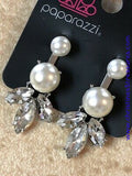 A solitaire white pearl attaches to a double-sided post, designed to fasten behind the ear. Infused with an oversized pearl and white rhinestone fringe, the double sided-post peeks out beneath the ear for a glamorous finish. Earring attaches to a standard post fitting. Sold as one pair of double-sided post earrings.  P5PO-WTXX-211XX