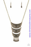 Gradually decreasing in size down the chest, decorative brass crescent plates connect into a bold pendant. Dotted in dainty studs, teardrop brass frames swing from the bottom of the tribal inspired pendant for a fierce finish. Features an adjustable clasp closure. Sold as one individual necklace. Includes one pair of matching earrings.  P2TR-BRXX-082XX