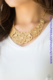 Featuring lattice-like patterns, shimmery gold flowers bloom below the collar for a seasonal look. Features an adjustable clasp closure. Sold as one individual necklace. Includes one pair of matching earrings.  P2WH-GDXX-121XX