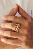 Featuring a double row of metallic rope-like patterns, a thick copper band curls around the finger for a rustic look. Features a stretchy band for a flexible fit. Sold as one individual ring.  P4MN-URCP-007XX