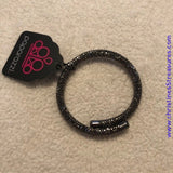 Bedazzled in glittery hematite rhinestones, a bendable cuff-like bracelet delicately curls around the wrist for a refined look. Sold as one individual bracelet.  P9RE-BKXX-273XX