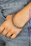 Bedazzled in glittery hematite rhinestones, a bendable cuff-like bracelet delicately curls around the wrist for a refined look. Sold as one individual bracelet.  P9RE-BKXX-273XX