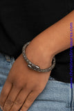 Bedazzled in glittery hematite rhinestones, a bendable cuff-like bracelet delicately curls around the wrist for a refined look. Sold as one individual bracelet.  P9RE-BKXX-273XX