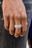 Brushed in an antiqued finish, stacked rows of chevron-like patterns are etched and embossed across a thick silver band for a tactile look. Features a stretchy band for a flexible fit. Sold as one individual ring.  Fits most 10-12  P4MN-URSV-006XX