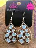 2018 July Fashion Fix Exclusive Varying in shape, glassy blue moonstones are sprinkled across the center of a silver teardrop, creating a whimsical lure. Earring attaches to a standard fishhook fitting. Sold as one pair of earrings.  P5RE-BLXX-302XX