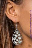 Varying in shape, glassy white moonstones are sprinkled across the center of a silver teardrop, creating a whimsical lure. Earring attaches to a standard fishhook fitting. Sold as one pair of earrings. P5RE-WTXX-302XX