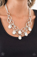 BLOCKBUSTER PIECE Joined by dainty silver links, two rows of dramatic silver chain layer below the collar in a fierce fashion. Glittery white teardrops drip from the glistening layers, adding a timeless shimmer to the show-stopping piece. Features an adjustable clasp closure. Sold as one individual necklace. Includes one pair of matching earrings.  P2RE-WTXX-178XX