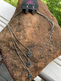 2018 August Fashion Fix Exclusive  3 Layer short necklace with blue rhinestones in silver. Features a lobster claw clasp, 2" extender and a free pair of matching earrings.