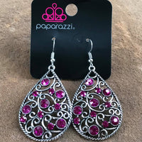 2018 November Exclusive - Pink Earrings  Pear shaped silver tone earrings with pink rhinestones varying in size, glittery colorful rhinestones are sprinkled along a silver filigree backdrop for a whimsical look. Earring attaches to a standard fishhook fitting. Sold as one pair of earrings.  P5RE-PKXX-059XX