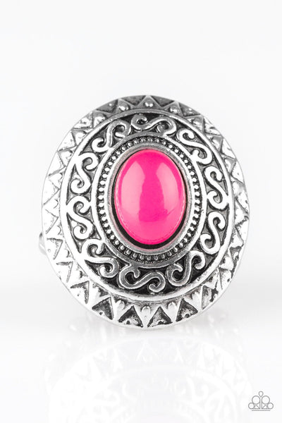 A glowing pink stone is pressed in the center of a dramatic silver frame radiating with shimmery sunburst details for a seasonal look. Features a stretchy band for a flexible fit. Sold as one individual ring.  P4TR-PKXX-031XX