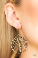 Brushed in an antiqued shimmer, a lifelike tree branches out across a brass hoop for a seasonal look. Earring attaches to a standard fishhook fitting. Sold as one pair of earrings.  P5SE-BRXX-049XX
