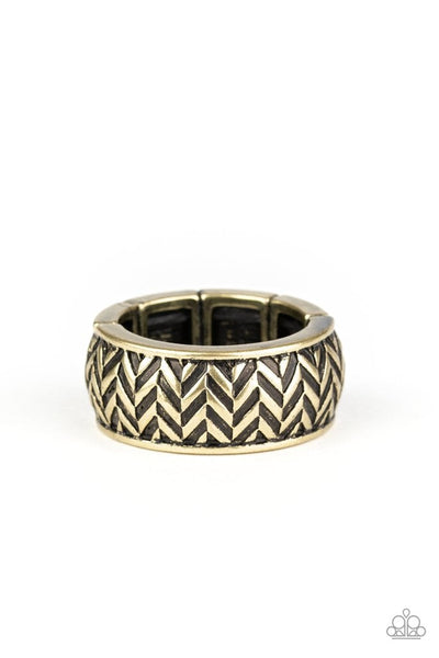 Brushed in an antiqued finish, stacked rows of chevron-like patterns are etched and embossed across a thick brass band for a tactile look. Features a stretchy band for a flexible fit. Sold as one individual ring.  Fits most 10-12  P4MN-URBR-002XX