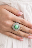 "Treasure Chest Shimmer" (P4WH-GRXX-156TC)  A shiny Biscay Green bead dots the center of a studded silver frame, adding a refreshing pop of color to any outfit. Features a stretchy band for a flexible fit. Sold as one individual ring.