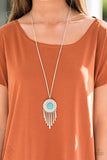 2018 September Fashion Fix - Simply Santa Fe  A refreshing turquoise stone is pressed into the center of a shimmery silver disc radiating with glistening tribal details. Swinging from the bottom of a lengthened silver chain, the bold pendant gives way to a fringe of delicately hammered silver rods for a wanderlust finish. Features an adjustable clasp closure. Sold as one individual necklace. Includes one pair of matching earrings.  P2SE-BLXX-333GU