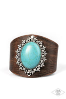 2019 BLACK DIAMOND LIFE OF THE PARTY BRING BACK PIECE Brushed in a distressed finish, a thick band of leather wraps around the wrist. An oversized turquoise stone is pressed into the center of a regal silver frame, creating a dramatic centerpiece. Features an adjustable snap closure. P9UR-BNXX-159XX