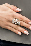 Ring: "Dancing Diamonds" (P4RE-WTXX-381TO) Dotted in glassy white rhinestones and dainty white pearls, whirling silver bands sweep across the finger in a refined finish. Features a stretchy band for a flexible fit. Sold as one individual ring.