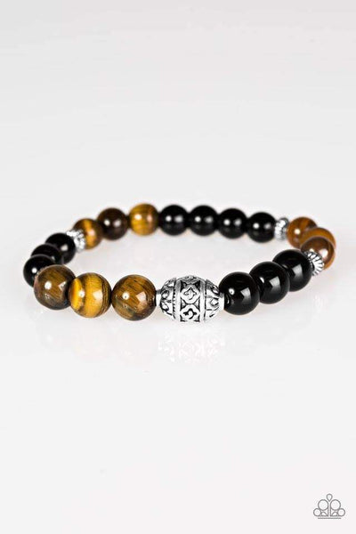 Infused with ornate silver accents, polished black beads and earthy tiger's eye stones are threaded along a stretchy elastic band for a seasonal look. Sold as one individual bracelet. P9SE-URBN-316XX