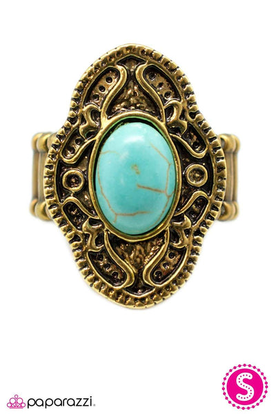 A smooth blue stone chiseled into a chic oval adorns the center of a vintage inspired frame. Brushed in an antiqued shimmer, the alluring brass frame features scalloped edging and intricate filigree. Sold as one individual ring. P4SE-BRBL-019XX