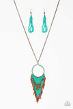 Infused with blue, brass, and red seed beads, a colorful dream catcher like pendant swings from the bottom of a lengthened brass chain for a tribal inspired look. Features an adjustable clasp closure. Sold as one individual necklace. Includes one pair of matching earrings. P2TR-BLXX-077XX