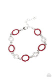 A series of red and white rhinestone encrusted silver frames link across the wrist, creating a bubbly sparkle. Features an adjustable clasp closure. Sold as one individual bracelet. P9RE-RDXX-107XX