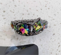 2020 May Fashion Fix Exclusive Oil Spill Multi Colored black gunmetal ring. Features a dainty stretch back. Sold as one individual ring. P4ED-MTXX-020TF