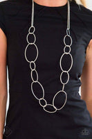 2018 September Fashion Fix - Fiercely 5th Avenue Swinging from strands of doubled silver chains, oversized asymmetrical hoops dramatically link across the chest for a refined industrial look with lots of sheen. Features an adjustable clasp closure. Sold as one individual necklace. Includes one pair of matching earrings.  P2RE-SVXX-282GW
