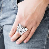Brushed in an antiqued finish, a dramatic silver butterfly blooms across the finger for a whimsical look. Features a stretchy band for a flexible fit. P4WH-SVXX-114XX
