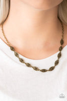Brushed in an antiqued shimmer, dainty floral charms link below the collar for a seasonal look. Features an adjustable clasp closure. Sold as one individual necklace. Includes one pair of matching earrings.  Get The Complete Look! Bracelet: "Easy Daisy - Brass" (Sold Separately)  P2WH-BRXX-122WB