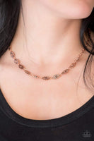 Brushed in an antiqued shimmer, dainty floral charms link below the collar for a seasonal look. Features an adjustable clasp closure. Sold as one individual necklace. Includes one pair of matching earrings.  Get The Complete Look! Bracelet: "Easy Daisy - Copper" (Sold Separately)  P2WH-CPXX-129VZ